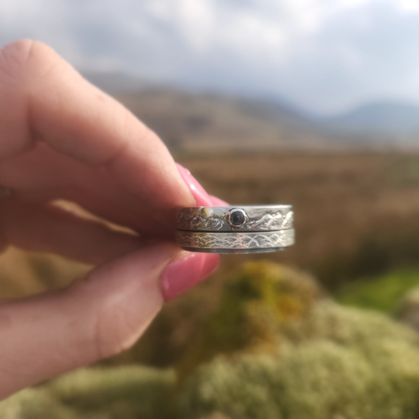 Spinner Ring with Mountain and spinning water ring
